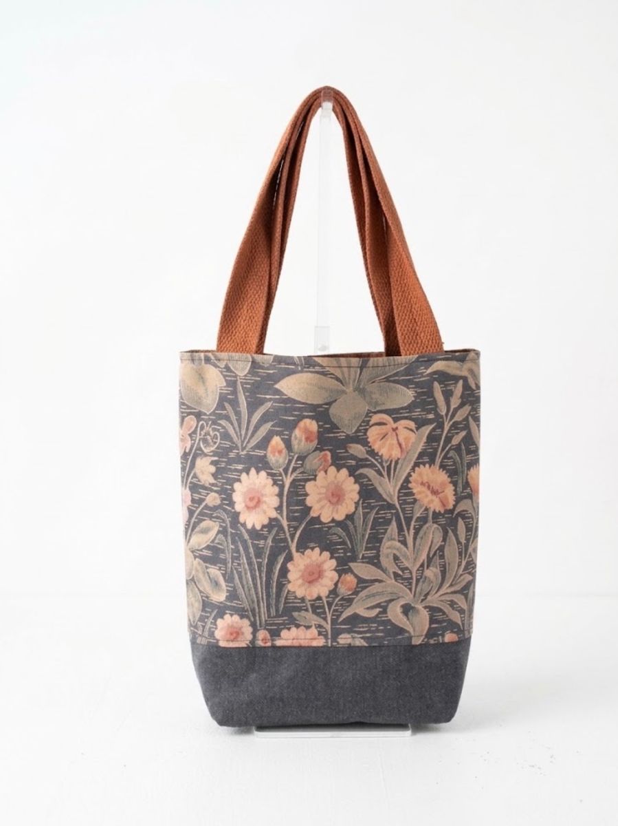 Small tote in a vintage slate floral with a charcoal base and rust handles